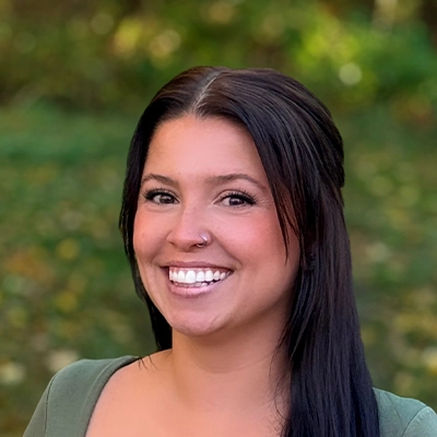 Office Manager Brittany Smiling Outdoors