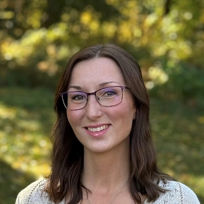 Patient Care Coordinator Katie Smiling Outdoors